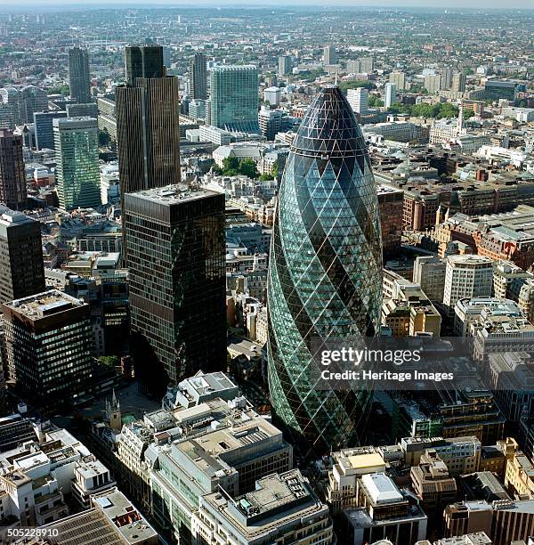 St Mary Axe, City of London, 2000s. Aerial view of the 'Gherkin' and the surrounding business district. The building was previously named the Swiss...