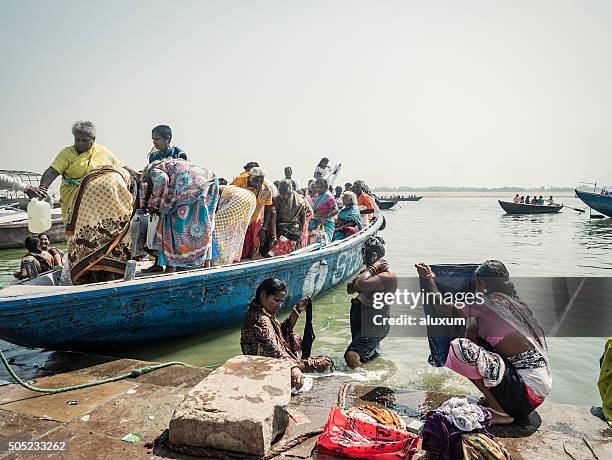 pilgrims in varanasi india - pilgrim stock pictures, royalty-free photos & images