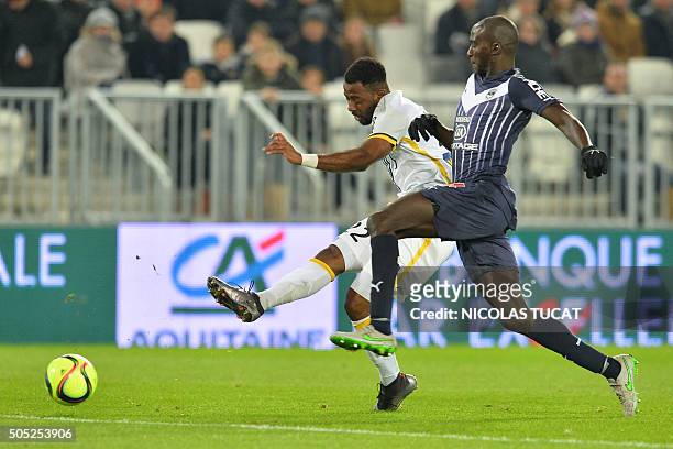 Lille's Ivorian forward Junior Tallo vies with Bordeaux's French defender Cedric Yambere during the French Ligue 1 football match between Bordeaux...