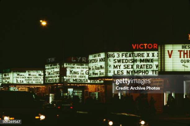 Cinemas in Times Square, New York City, USA, including the Lyric and Victory, 1978. Films on show include 'The Medusa Touch' and a number of...