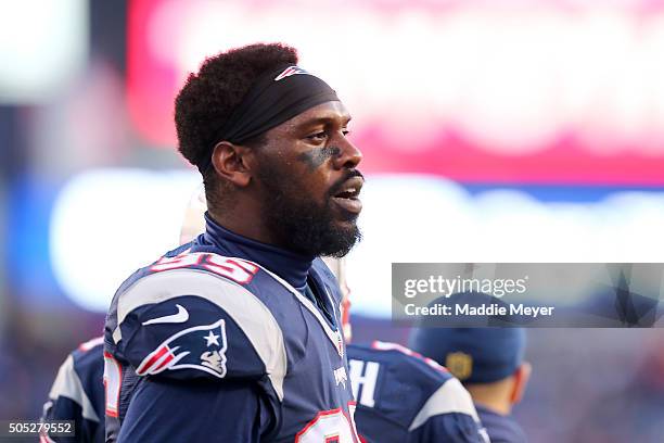 Chandler Jones of the New England Patriots looks on during warm ups prior to the AFC Divisional Playoff Game against the Kansas City Chiefs at...