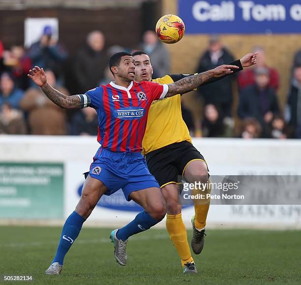 Joss Labadie of Dagenham & Redbridge contests the ball with Rod McDonald of Northampotn Town during the Sky Bet League Two match between Dagenham &...