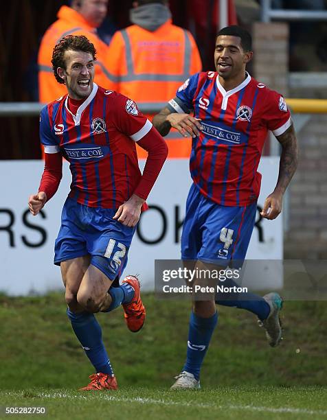 Christian Doidge of Dagenham & Redbridge celebrates with teamamate Joss Labadie after scoring his sides goal during the Sky Bet League Two match...