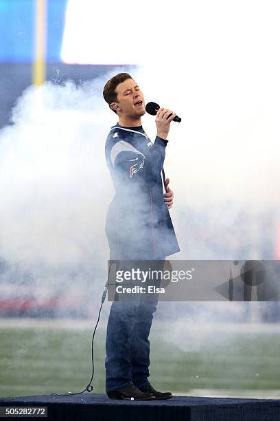 Singer Scotty McCreery sings the national anthem during the AFC Divisional Playoff Game between the Kansas City Chiefs and the New England Patriots...