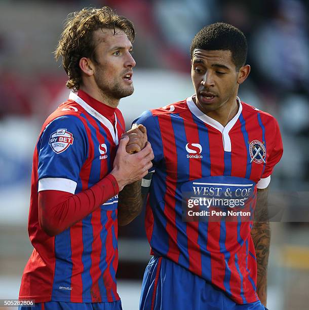 Christian Doidge of Dagenham & Redbridge celebrates with team mate Joss Labadie after scoring his sides goal during the Sky Bet League Two match...