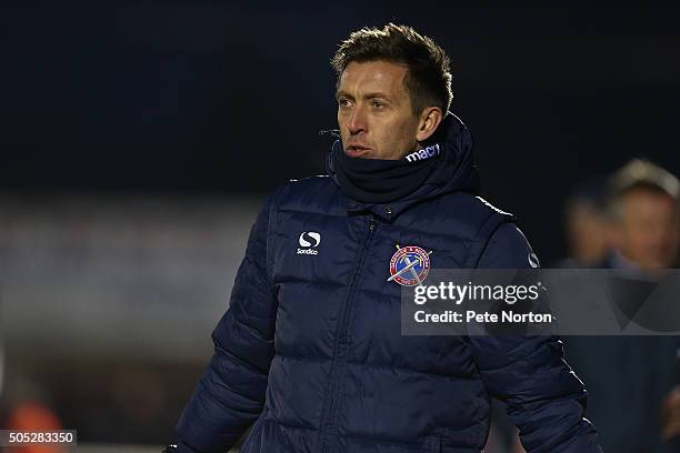 Dagenham & Redbridge coach Darren Currie looks on during the Sky Bet League Two match between Dagenham & Redbridge and Northampton Town at Chigwell...