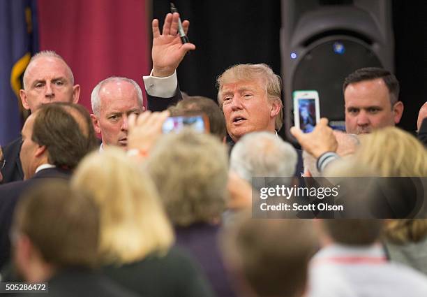 Republican presidential candidate Donald Trump greets guests after speaking at the 2016 South Carolina Tea Party Coalition Convention on January 16,...