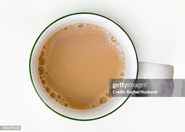 freshly poured cup of tea from above - tazza da tè foto e immagini stock