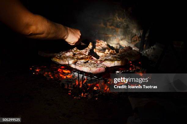 juicy stakes grilling on the barbeque - kataraktis village stock pictures, royalty-free photos & images
