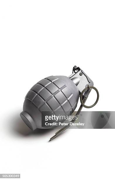 hand grenade with copy space - hand grenade stock pictures, royalty-free photos & images