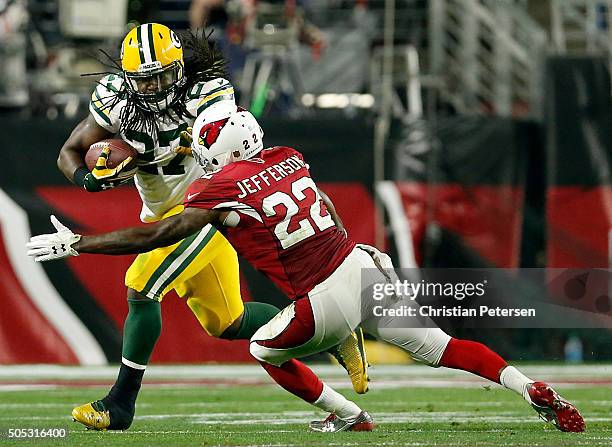 Running back Eddie Lacy of the Green Bay Packers runs past strong safety Tony Jefferson of the Arizona Cardinals during the second half of the NFC...