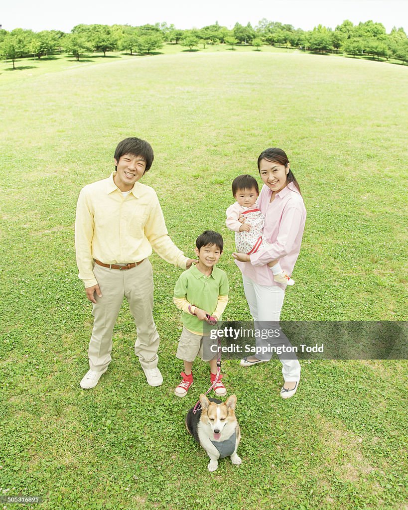 Cheerful Family At Park