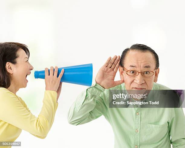 Shouting In Ear Yelling In Ear Photos and Premium High Res Pictures - Getty Images