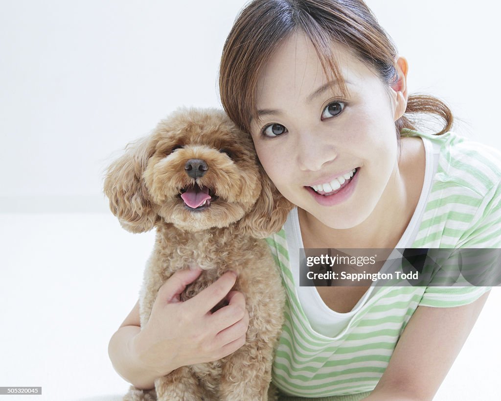 Woman Enjoying With Her Pet Dog
