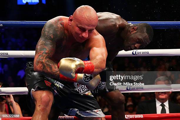 Deontay Wilder knocks out Artur Szpilka in the 9th round during their WBC Heavyweight Championship bout at Barclays Center on January 16, 2016 in...