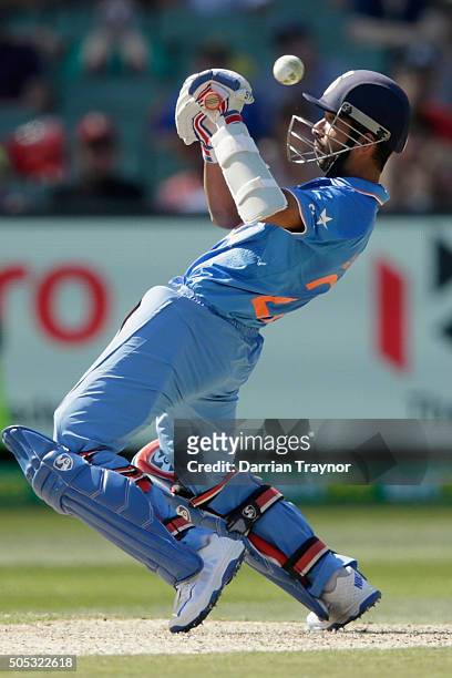 Ajinkya Rahane of India attempts to guide the ball during game three of the One Day International Series between Australia and India at Melbourne...