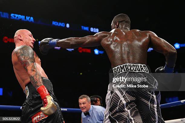 Artur Szpilka avoids the punch by Deontay Wilder during their WBC Heavyweight Championship bout at Barclays Center on January 16, 2016 in Brooklyn...