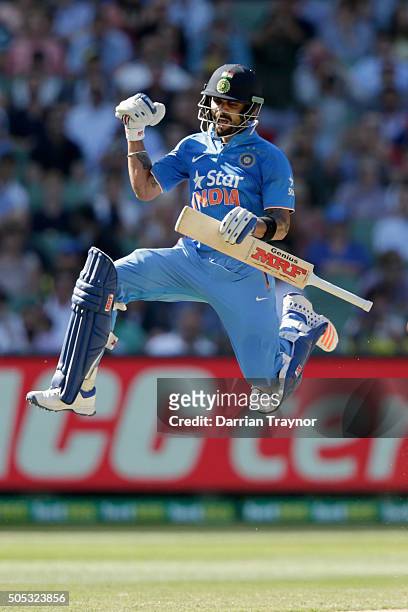 Virat Kohli of India celebrates his century during game three of the One Day International Series between Australia and India at Melbourne Cricket...