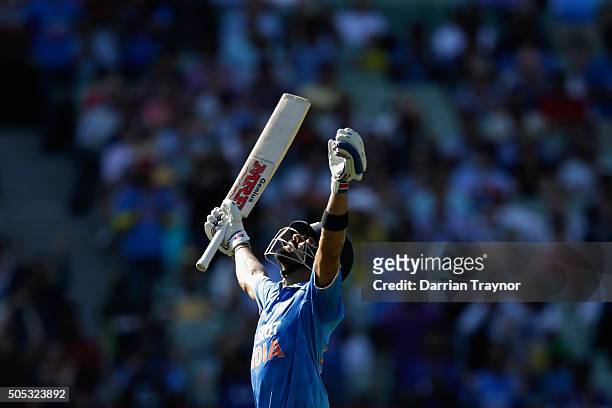 Virat Kohli of India celebrates his century during game three of the One Day International Series between Australia and India at Melbourne Cricket...