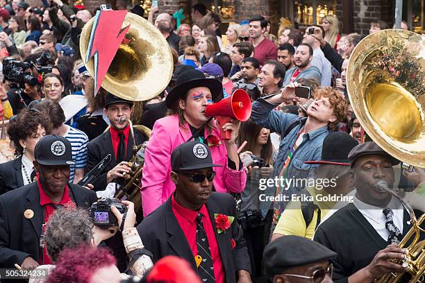 Win Butler of Arcade Fire and Preservation Hall Jazz Band lead a second line parade in honor of David Bowie on January 16, 2016 in New Orleans,...