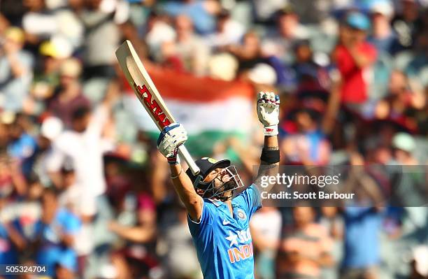 Virat Kohli of India celebrates as he reaches his century during game three of the One Day International Series between Australia and India at the...