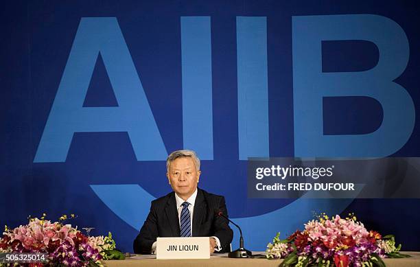 Jin Liqun, the first president of the Asian Infrastructure Investment Bank , speaks to journalists during a press conference in Beijing on January...