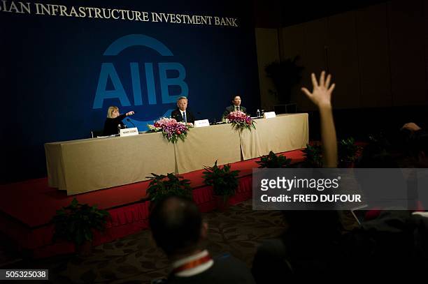 Jin Liqun , the first president of the Asian Infrastructure Investment Bank , speaks to journalists during a press conference in Beijing on January...
