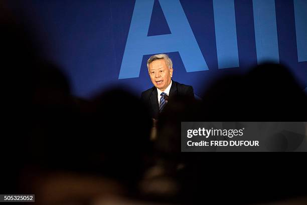 Jin Liqun, the first president of the Asian Infrastructure Investment Bank , speaks to journalists during a press conference in Beijing on January...