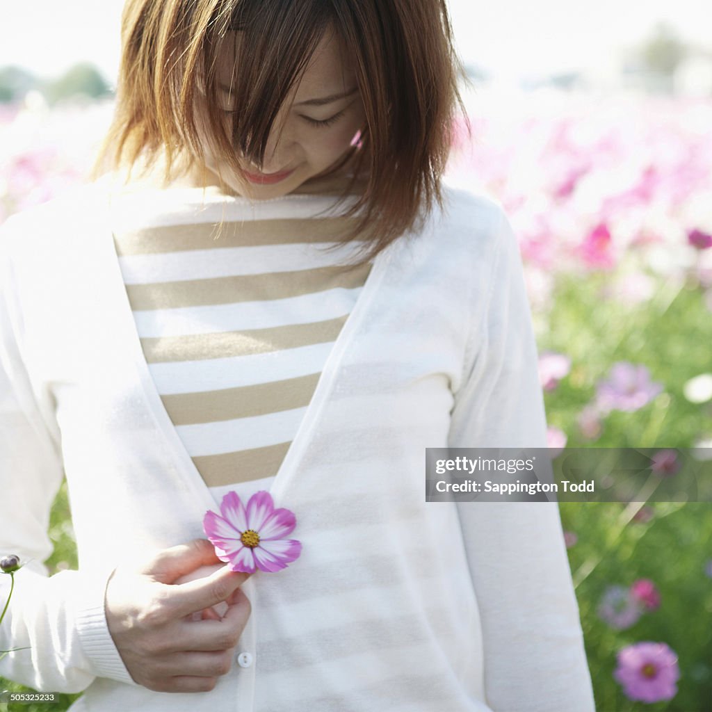 Young Woman With Cosmos Flower