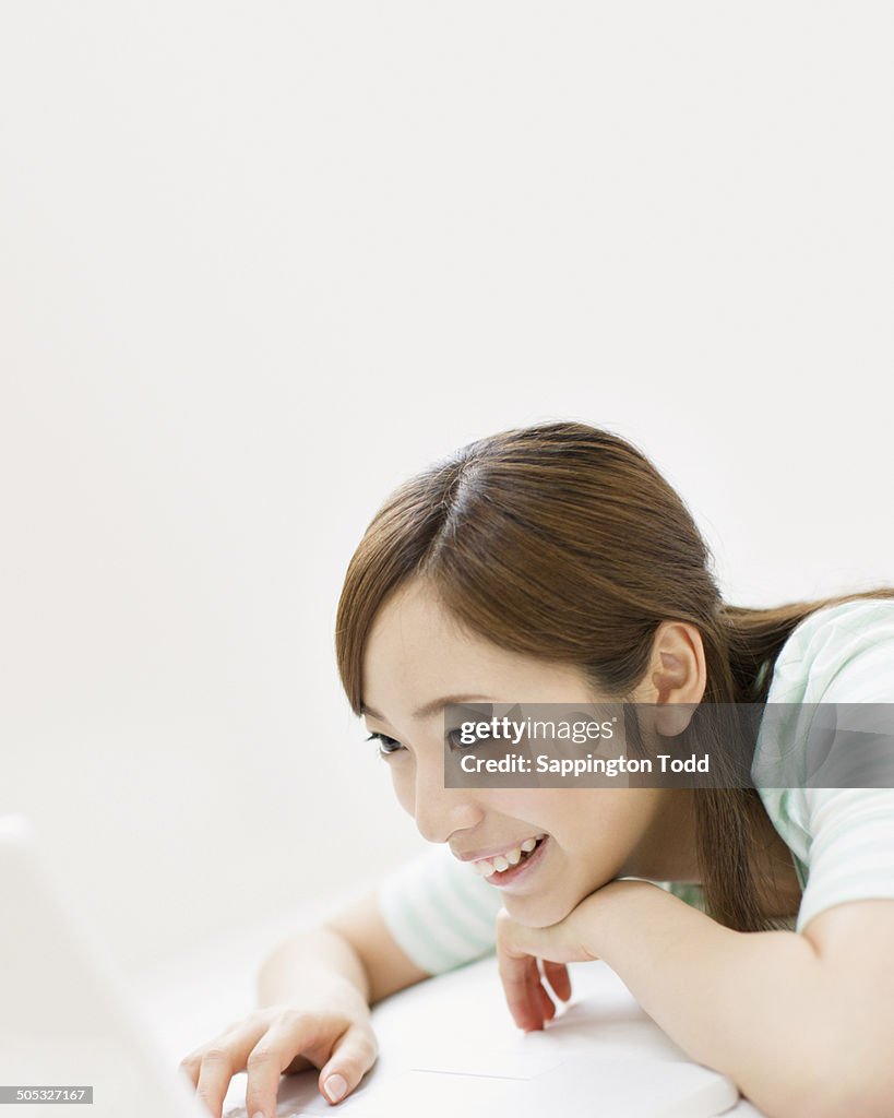 Young Woman Using Laptop