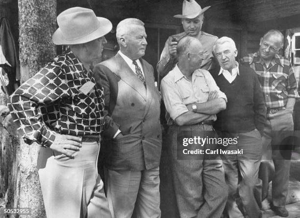 Dwight D. Eisenhower's vacation on a Colorado ranch is spent with friends and associates, James H. Duff, Palmer E. Hoyt, Governer Daniel Thornton and...