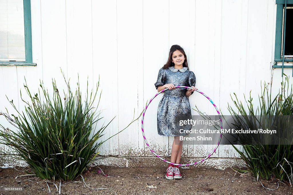 Girl holding hoop