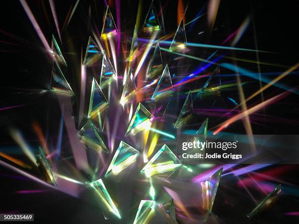 multiple prisms of light shining in various angles - refraction stock pictures, royalty-free photos & images