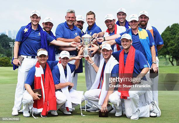 The team of Europe together with captain Darren Clarke celebrate with the trophy after winning the EurAsia Cup presented by DRB-HICOM at Glenmarie...
