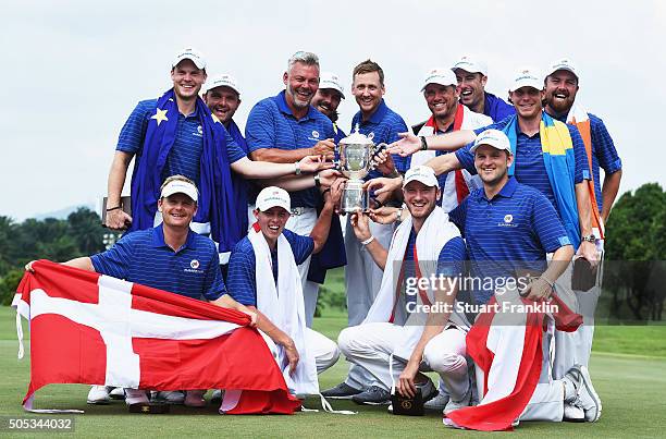 The team of Europe together with captain Darren Clarke celebrate with the trophy after winning the EurAsia Cup presented by DRB-HICOM at Glenmarie...