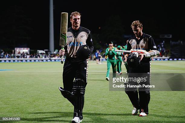Martin Guptill of the Black Caps acknowledges the crowd with Kane Williamson of the Black Caps after winning the International Twenty20 match between...