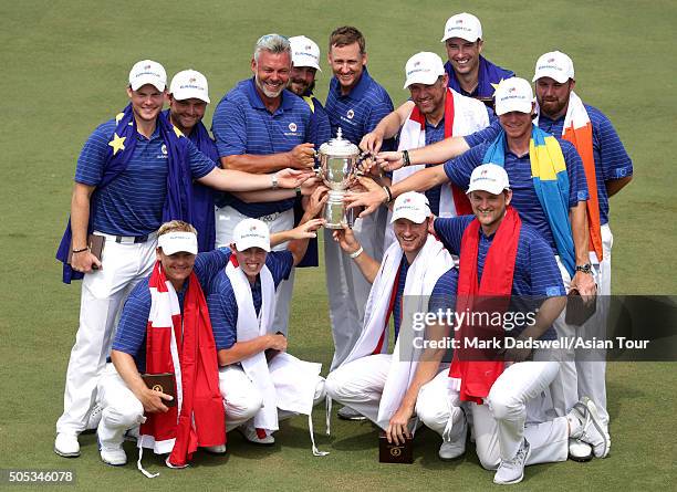 Team Europe Captain Darren Clarke and players are presented with the EurAsia Cup during day three of the EurAsia Cup presented by DRB-HICOM at...