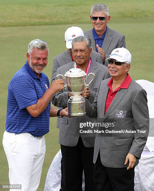 Malaysian Prime Minister Najib Razak presents the EurAsia Cup trophy to Team Europe Captain Darren Clarke during day three of the EurAsia Cup...