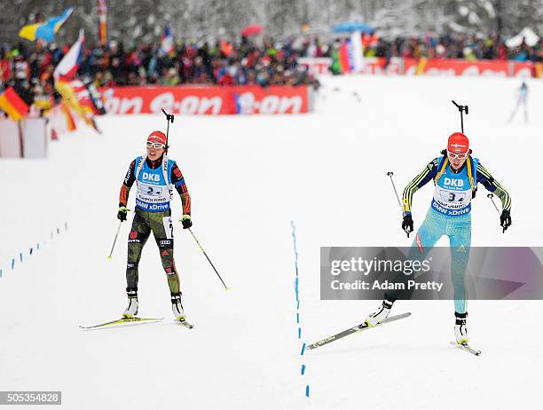 Olena Pidhrushna of the Ukraine crosses the line ahead of Laura Dahlmeier of Germany in the Women's 4x 6km relay on Day 5 of the IBU Biathlon WOrld...