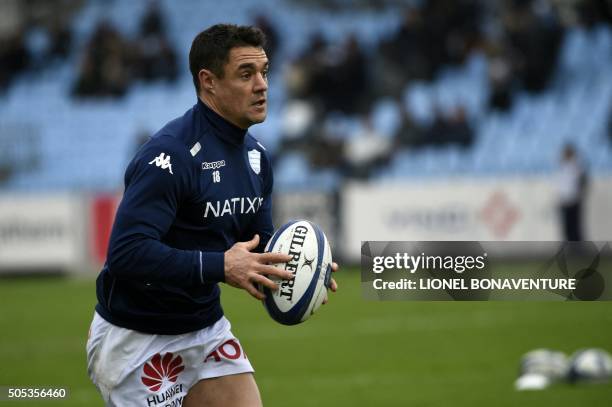 Racing Metro's flyhalf Dan Carter warms up before the European Champions Cup rugby union match beetween Racing Metro 92 vs Llanelli Scarlets on...