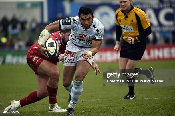 Racing Metro 92 New Zealand centre Casey Laulala runs to score a try during the European Rugby Champions Cup match beetween Racing Metro 92 vs...