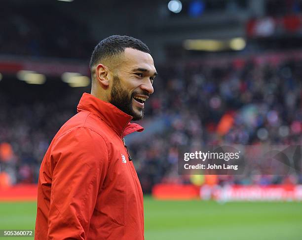 Steven Caulker of Liverpool laughs before the Barclays Premier League match between Liverpool and Manchester United at Anfield on January 17, 2016 in...