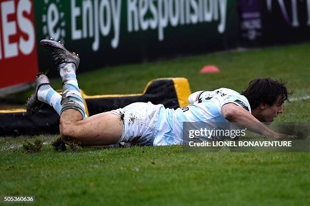 Racing Metro 92's Argentinian wing Juan Imhoff scores a try during the European Champions Cup rugby union match between Racing Metro 92 and Llanelli...