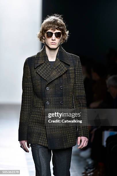 Model walks the runway at the Bottega Veneta Autumn Winter 2016 fashion show during Milan Menswear Fashion Week on January 17, 2016 in Milan, Italy.