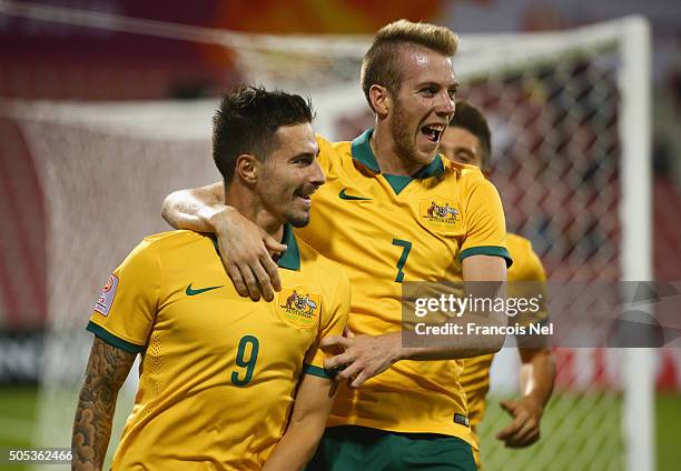 Jamie Maclaren of Australia celebrates with team mate Andrew Hoole as he scores their second goal during the AFC U-23 Championship Group D match...