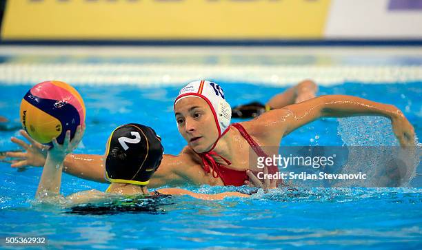 Belen Vosseberg of Germany is challenged by Roser Tarrago of Spain during the Women's Preliminary Group B match between Spain and Germany at the...