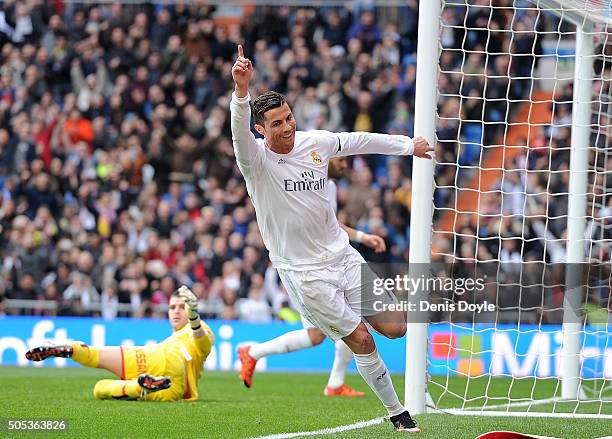 Cristiano Ronaldo of Real Madrid celebrates after scoring his team's 4th goal during the La Liga match between Real Madrid CF and Sporting Gijon at...