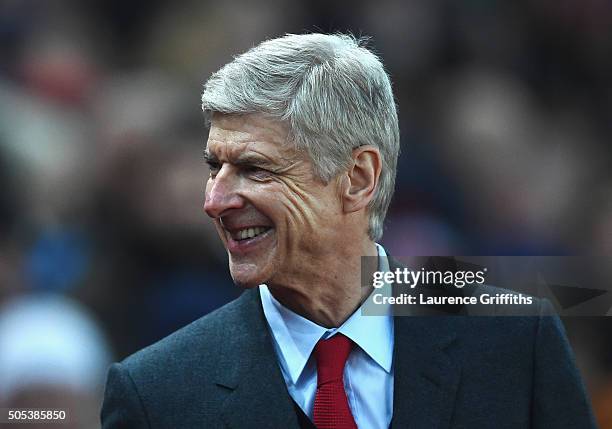 Arsene Wenger, manager of Arsenal smiles prior to the Barclays Premier League match between Stoke City and Arsenal at Britannia Stadium on January...