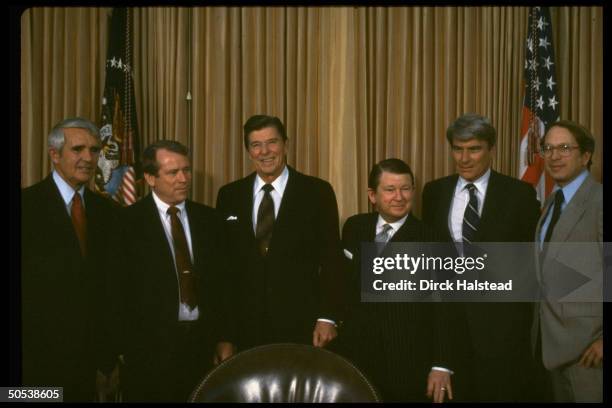 President Ronald Reagan standing with Paul Laxalt, Howard Baker, John Tower, John Warner and Sam Nunn in the White House after winning AWACs vote.