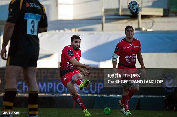Toulon's French scrum-half Eric Escande scores a penalty during the European Champions Cup rugby union match RC Toulon vs Wasps on January 17, 2016...